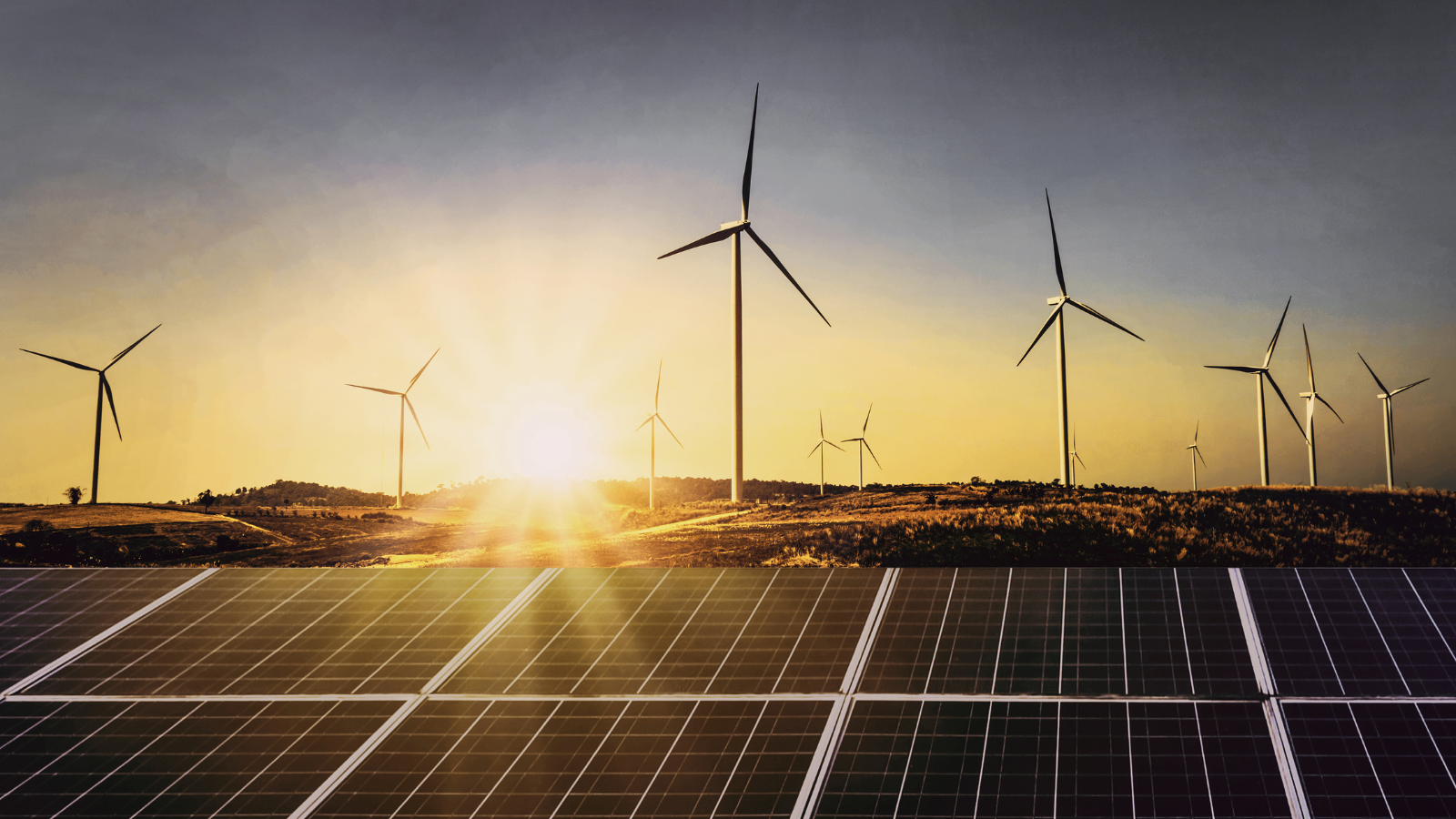 Stock image wind turbines and solar panels